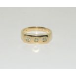 A Gents 18ct gold diamond three stone signet ring, approx 0.3ct, Size Q
