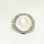 Silver and CZ dress ring with large central opal. Size M/N.