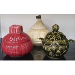 Three lidded vegetable shaped ceramic pots.