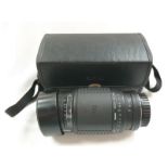 A Sigma Zoom AF-APO camera lens in case (REF 145).