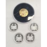 A collection of five cased commemorative coins (REF 75).