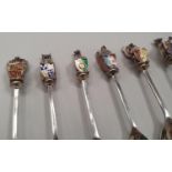 A set of Nine silver hallmarked Queens Beast Spoons (433g).