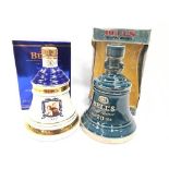 Two boxed Bell?s Scotch Whisky Wade porcelain decanters: one ?To Commemorate the Golden Wedding