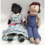 A pair of cloth dolls - one in the Kathe Kruse style.