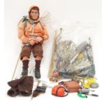 Action Man in full Mountain Rescue outfit together with a bag of accessories.