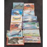 Collection of 12 boxed model airplane kits to include Revell and Airfix. Unchecked for Completeness.