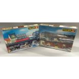 2 Faller HO building kit sets: 119 S-Bahn Metro Railway set and 551 S-Bahn Railway Bridge Kit. One