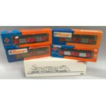Marklin HO 3388 Electric locomotive together with 4 x Roco post wagons, boxed.