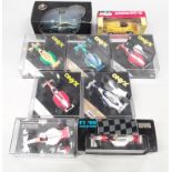 Box of mixed boxed diecast to include 3 x Scalextric Mini Coopers, Onyx racing cars, Quartzo models,