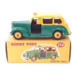 Dinky 254 Austin "Taxi" - two-tone, green, yellow including ridged hubs, black base, interior and