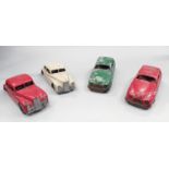 4 x Mettoy/Chad Valley tinplate cars. Fair condition.