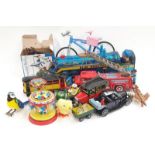 A quantity of tinplate windup toys to include Modern Toys (Japan) Piston Blue mountain train.