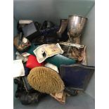 A large collection of miscellaneous items recovered from a misappropriated car to include silver.