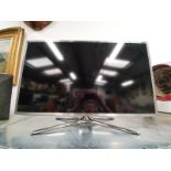 A Samsung 40-inch colour television on stand (Ref WP)
