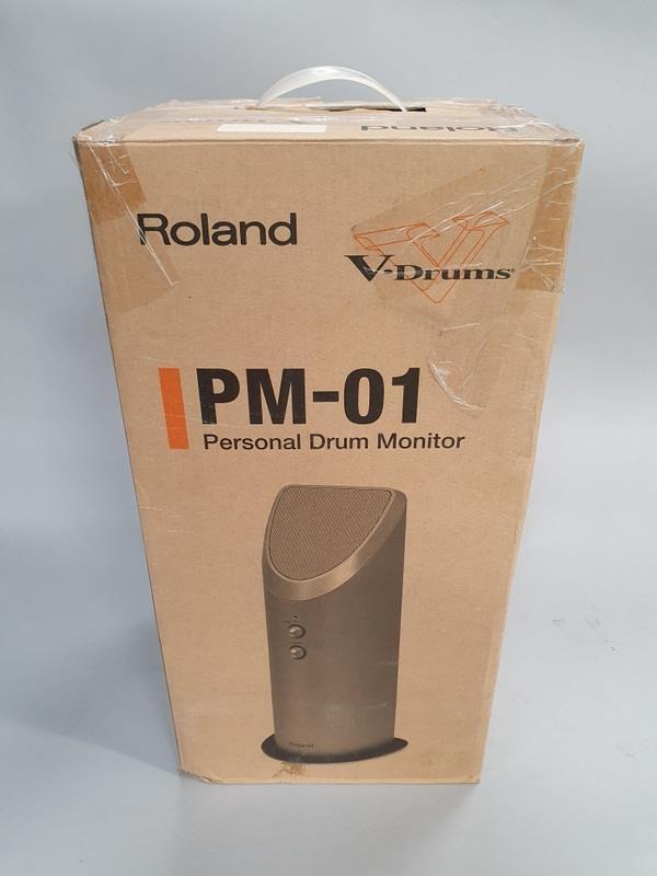 A Roland PM-01 personal drum monitor speaker (Ref WP)