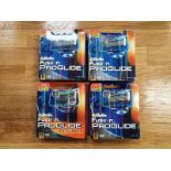 Four sealed packs of 8 Gillette Fusion Proglide razor cartridges (REF 7)