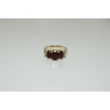 A 9ct gold amethyst and diamond shoulder ring. Size N. (Ref WP)