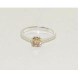 A white gold Diamond solitaire approx 0.75points 'champagne' ring, Size P. (Ref WP)