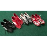 Four pairs of Adidas/Nike trainers/football boots - Size 9 and 10. (Ref WP)