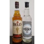 A 70cl bottle of bells Whisky together with a 70cl bottle of co-op vodka (REF 8)