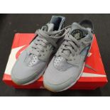 Pair of Nike Air Huarache trainers size 7 boxed (REF 99).