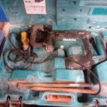 A Makita AVT demolition breaker with case. (Ref WP)