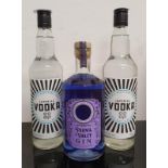 A bottle of Parma violet gin together with two bottles of co-op vodka ref 1, 11