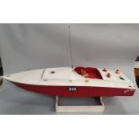 Radio control model speed boat on a stand (Ref WP)