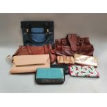 A collection of handbags and purses ref18