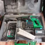 A Hitachi power drill with two batteries, a charger and case. (Ref WP)