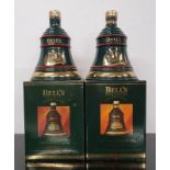 Two Bell's Whisky Wade Decanters to include Christmas 1993 and Christmas 1994. Both boxed and