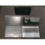Three assorted laptops by HP, Fujitsu and Acer (W110)