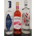 Three bottles of assorted alcohol to include M&S Triple Distilled Vodka, Echo Falls Rose Wine and