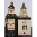 Two Bell's Whisky Wade decanters to include Christmas 1998 and Christmas 1988. Both boxed and