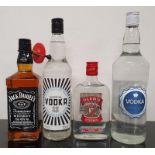 A bottle of Jack Daniel's Whiskey together with a bottle of Co-Op Vodka, Bottle of Asda Vodka and