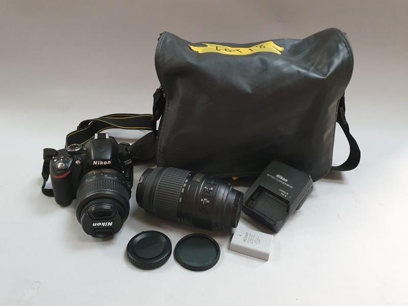 Nikon D3200 Camera with two lenses and two batteries in bag. (Ref 18)