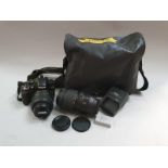 Nikon D3200 Camera with two lenses and two batteries in bag. (Ref 18)