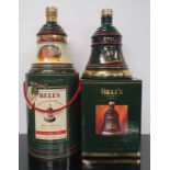 Two Bell's Whisky Wade decanters to include Christmas 1991 and Christmas 1992. Both boxed and