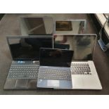 A collection of five assorted laptops to include Apple, Asus, HP and others (W106).