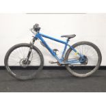 A blue pinnacle mountain bike. (REf 16).