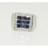 Gents diamond and sapphire ring set in 18ct white gold (tested) approx 10 grm size R ref h45