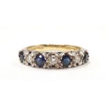 A Diamond/Sapphire 18ct gold ring, Size L. (Ref WP)