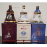 Three Bell's Whisky Wade Decanters to include Christmas 2001, Christmas 2002 and Queen Mother