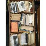 Large collection of vintage postcards and photographs.