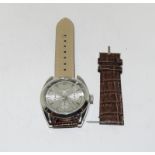 A Gents watch with strap detached.