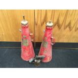 A pair of vintage fire extinguishers together with a vintage blowtorch.
