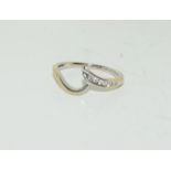 A Diamond wishbone ring on 18ct gold Size J