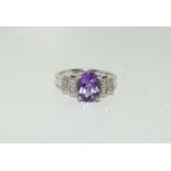 A Hallmarked purple stone sparkling shoulders Size L+