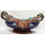 Majolica centrepiece by Sarrequemines of France with lion masks & snake handles - 40cm diameter.