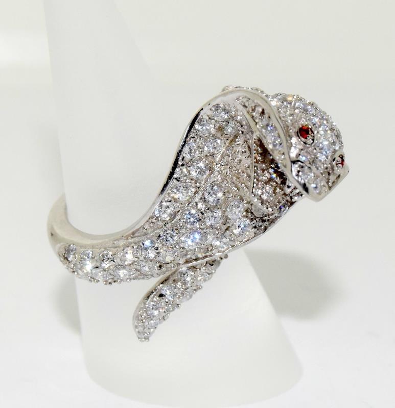 A Silver and CZ snake ring.